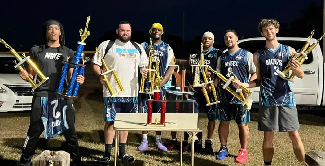 Championship team with trophies