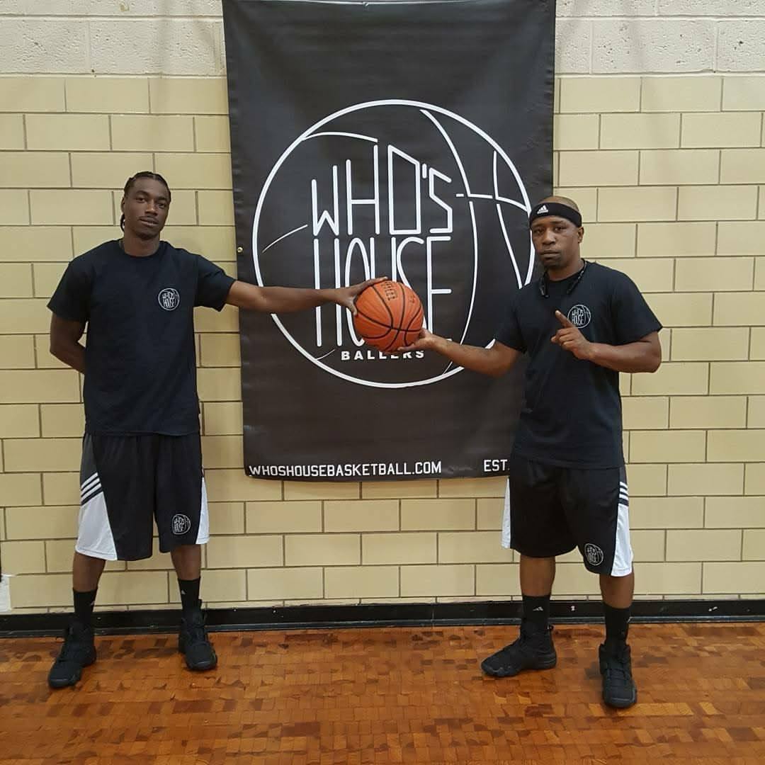 With Coach Shake in the gym under the Who's House Ballers banner