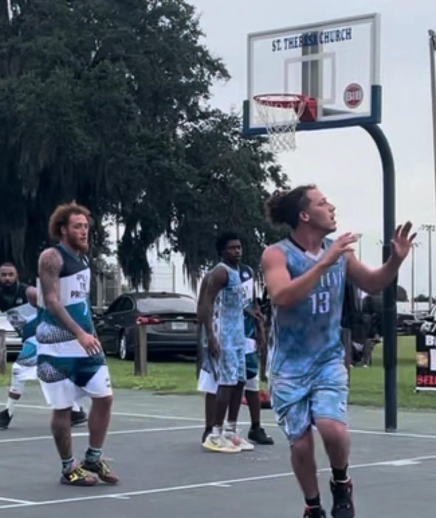 Player driving the lane during a league game